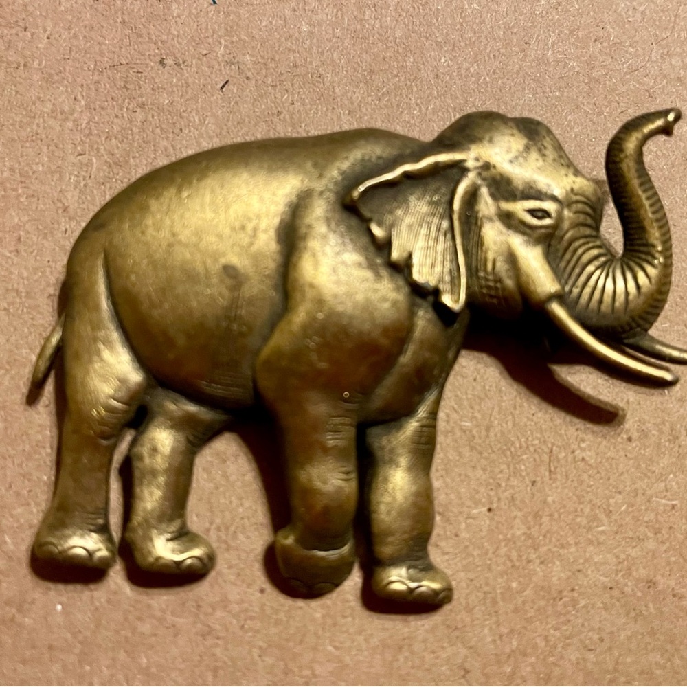 Elegant Gold Elephant Brooch